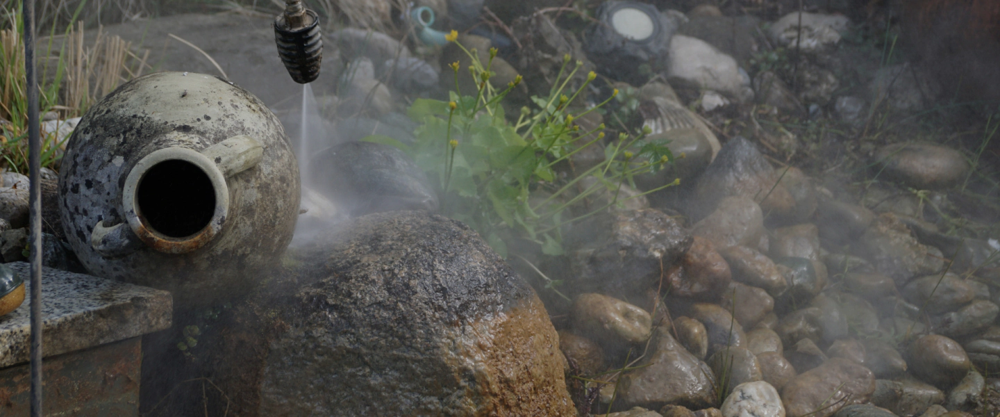 a dirty pond being cleaned