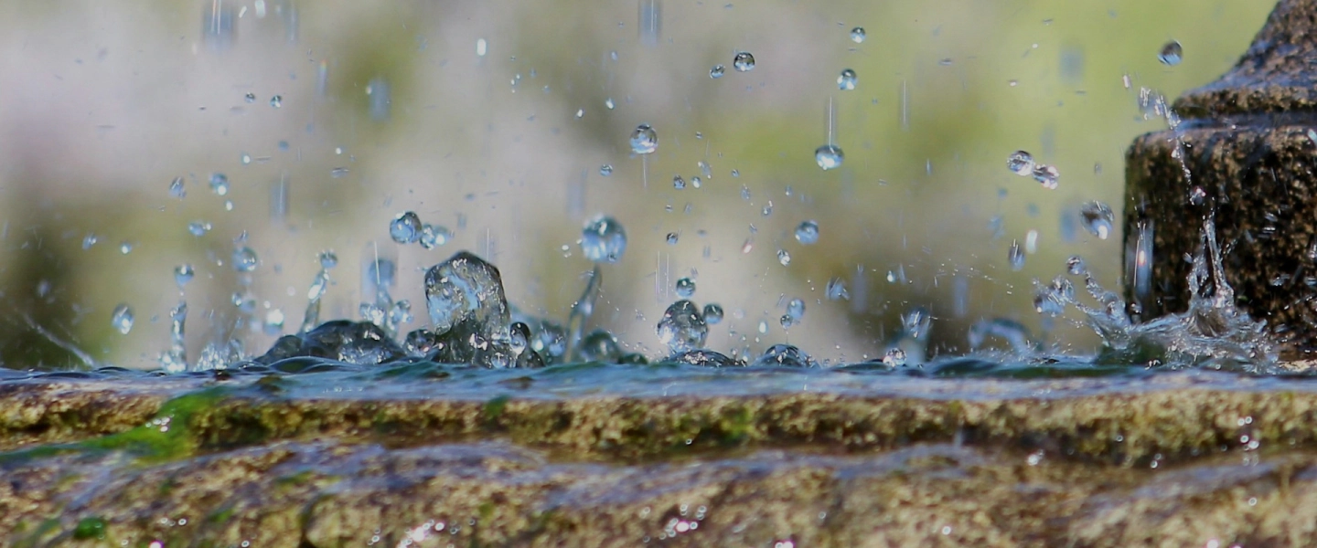 closeup of fountain water dropping